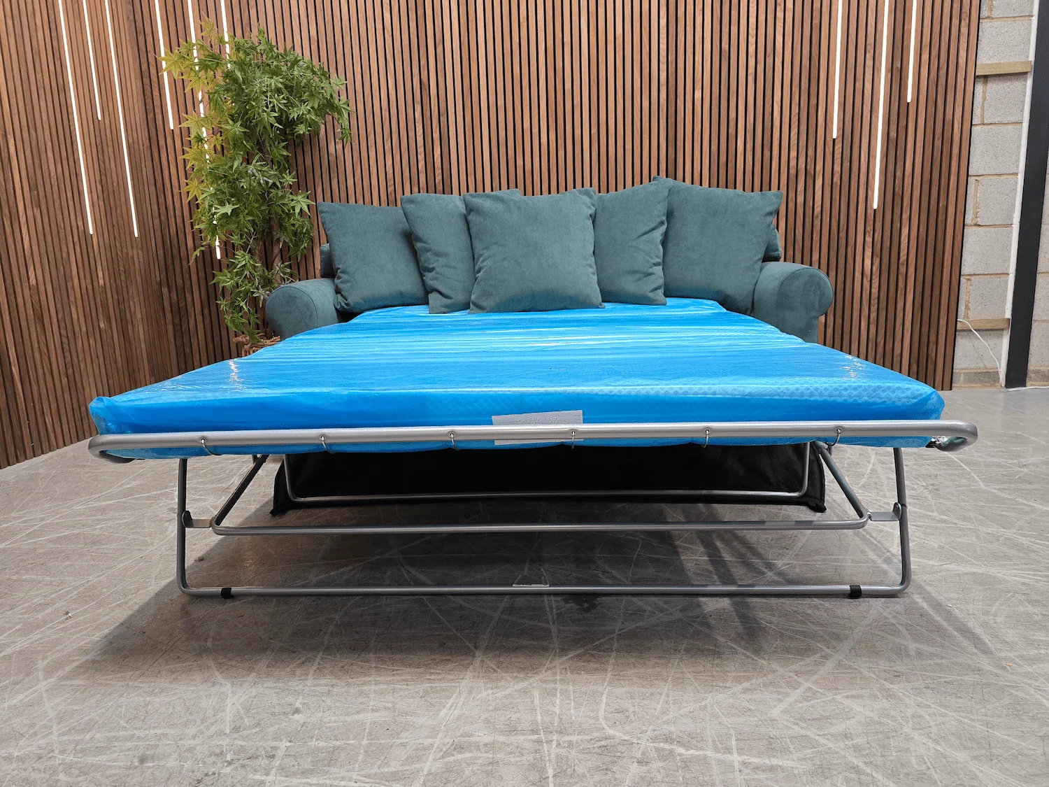 Teddy 3 seater sofa bed in peacock aquaclean
