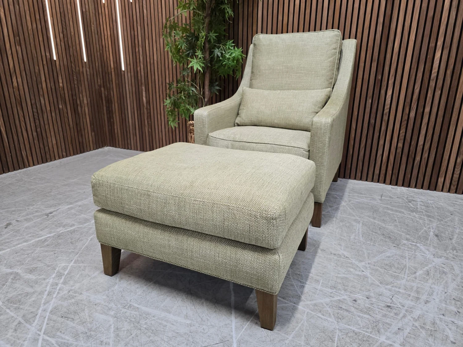 right side photo of high back iggy armchair & footstool