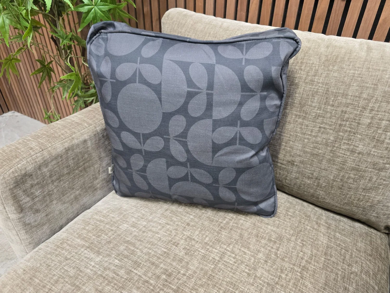 Zoomed in photo of patterned cushion Orla kiely Larch chair
