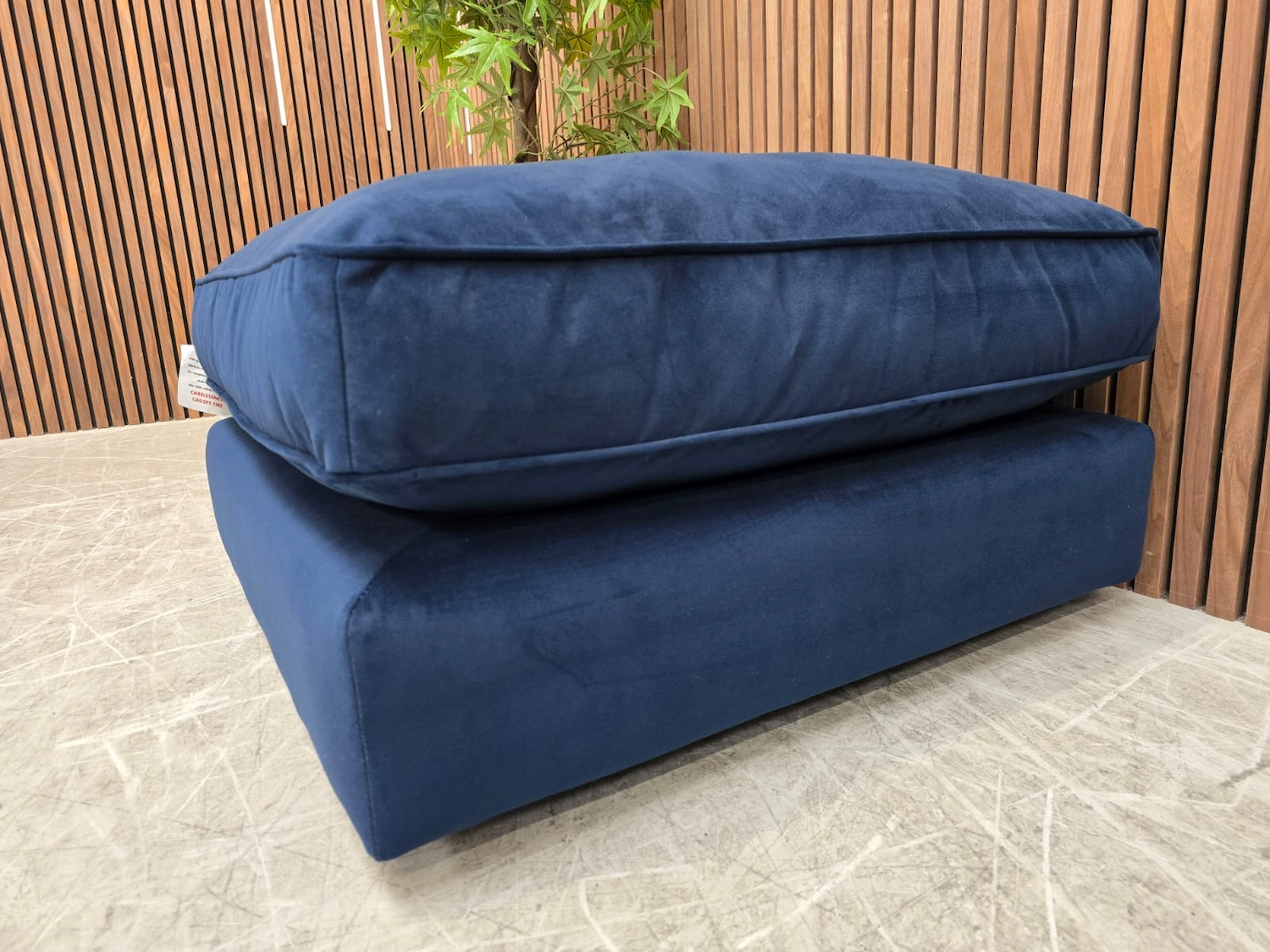 right side profile of the harrington footstool