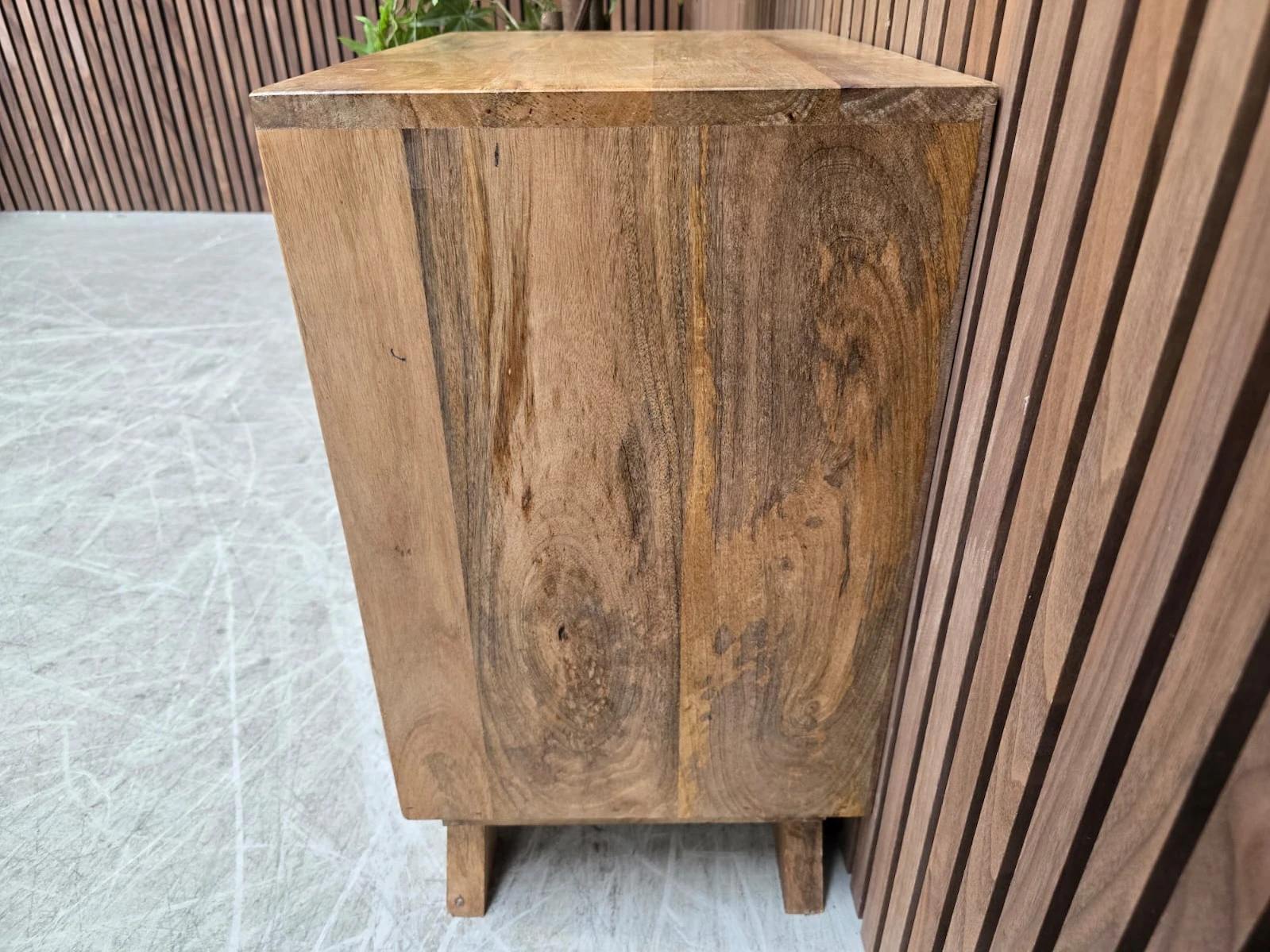 showing the mango wooden tone on the side of the cabinet