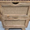 close up of the two rattan drawer fronts