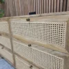 close up photo of rattan fronted drawers