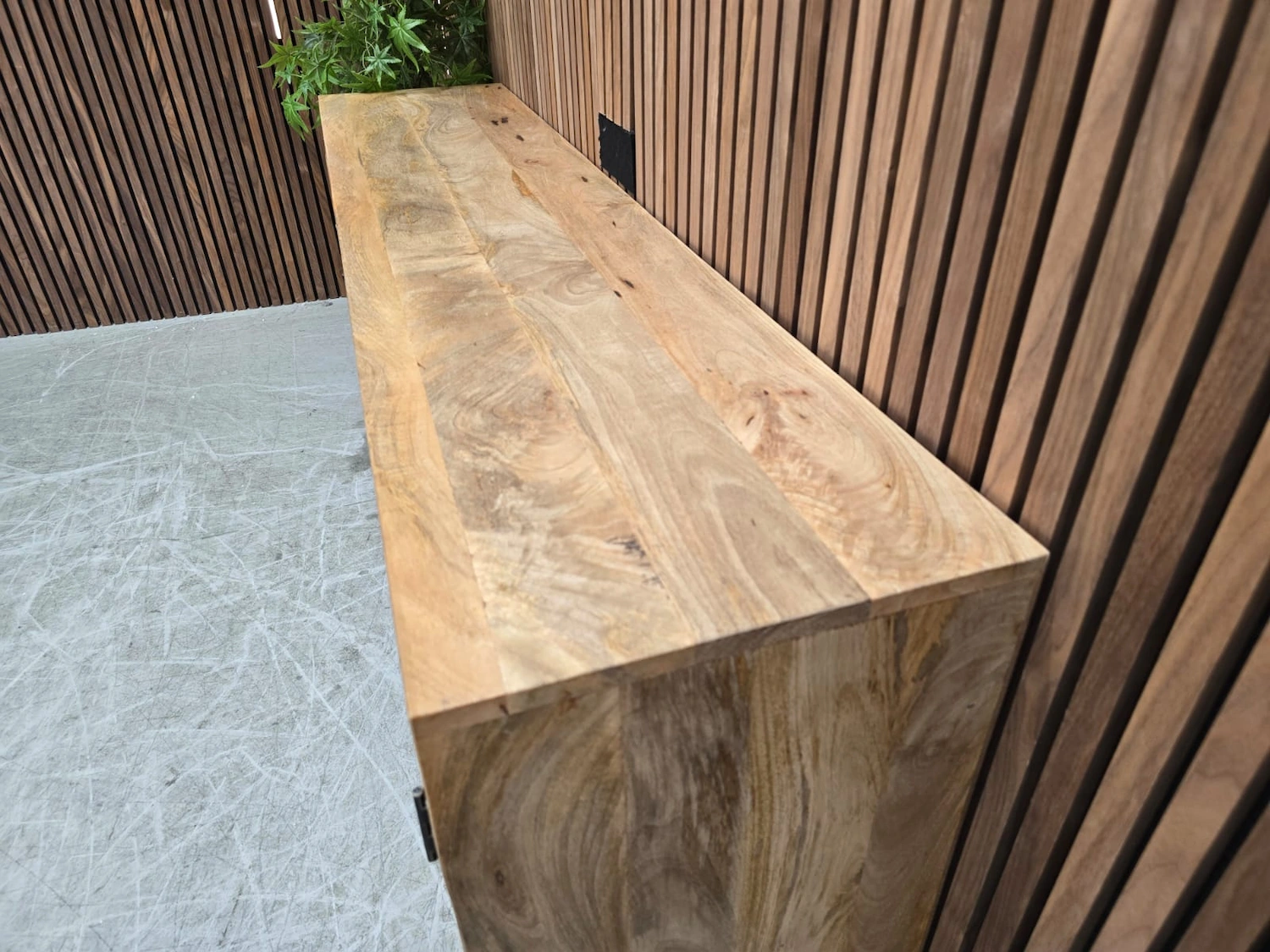 Boho large Rattan sideboard 5 close up of the mango wooden grain on top of the sideboard
