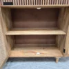 Boho large Rattan sideboard 7 inside the cupboard space of the sideboard which includes and shelf
