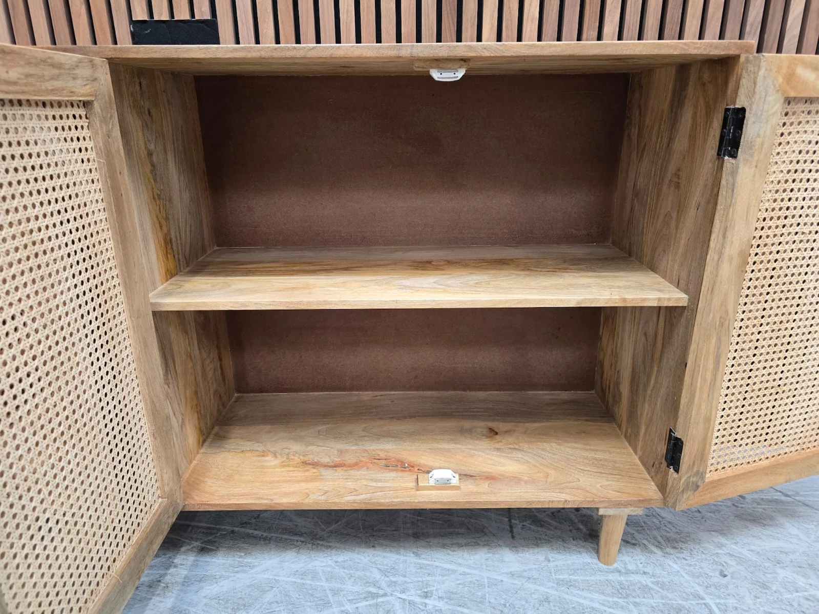 Boho large Rattan sideboard 7 inside the cupboard space of the sideboard which includes and shelf