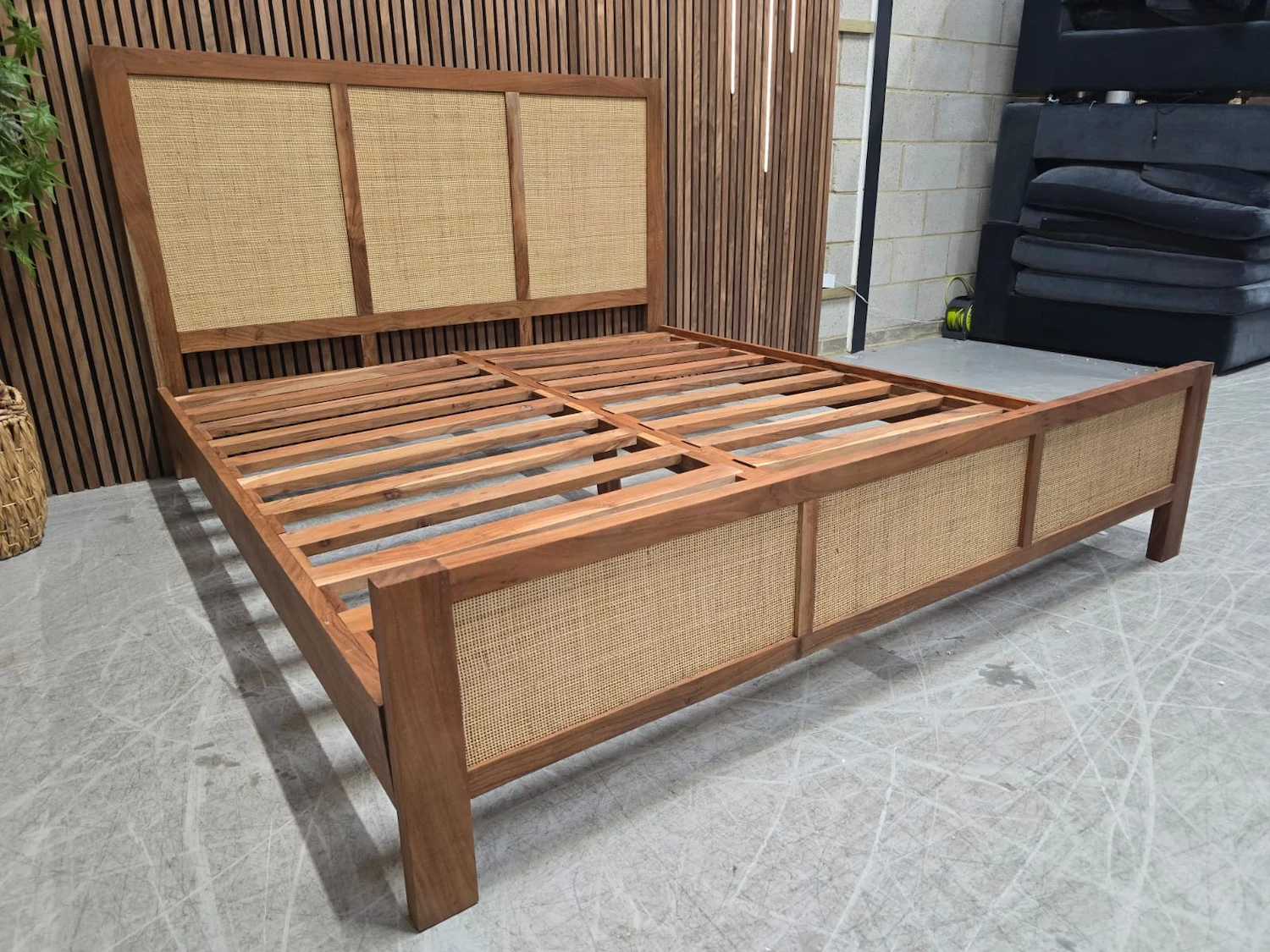 boho style sheesham wood and rattan super king bed frame from the left side