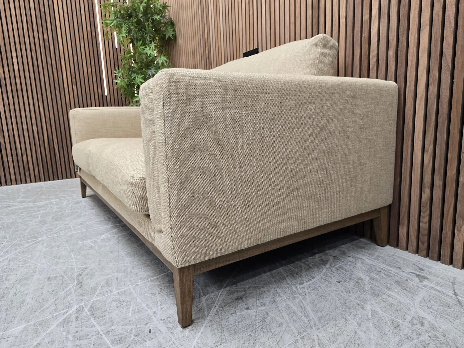 right side arm detail of the costello sofa in greige