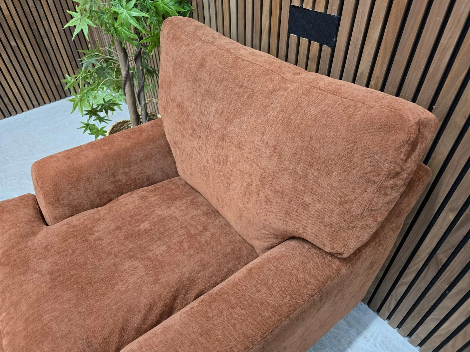 close up of the house soft touch fabric in koi on the back cushion