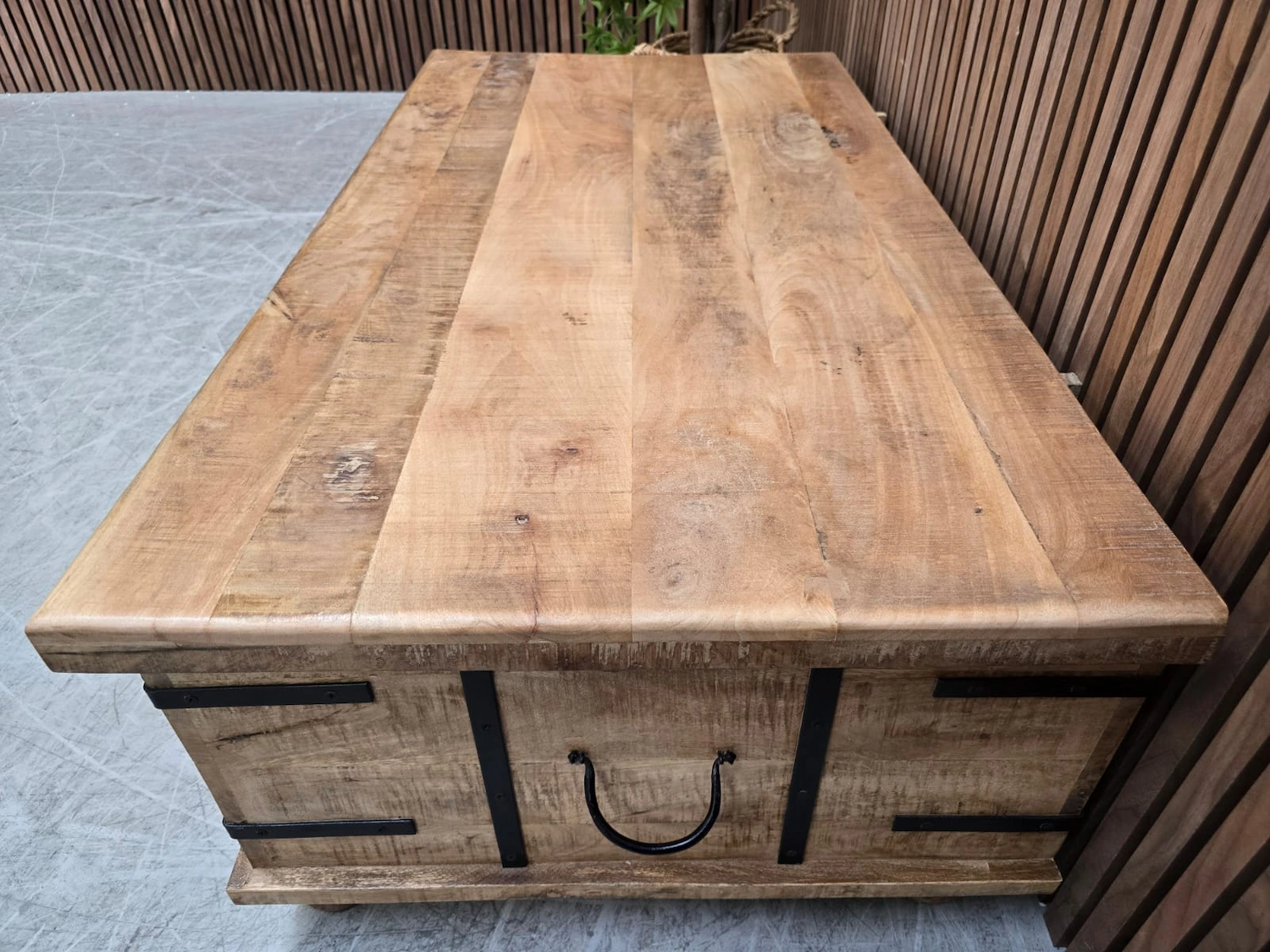 light mango wood top on the coffee table