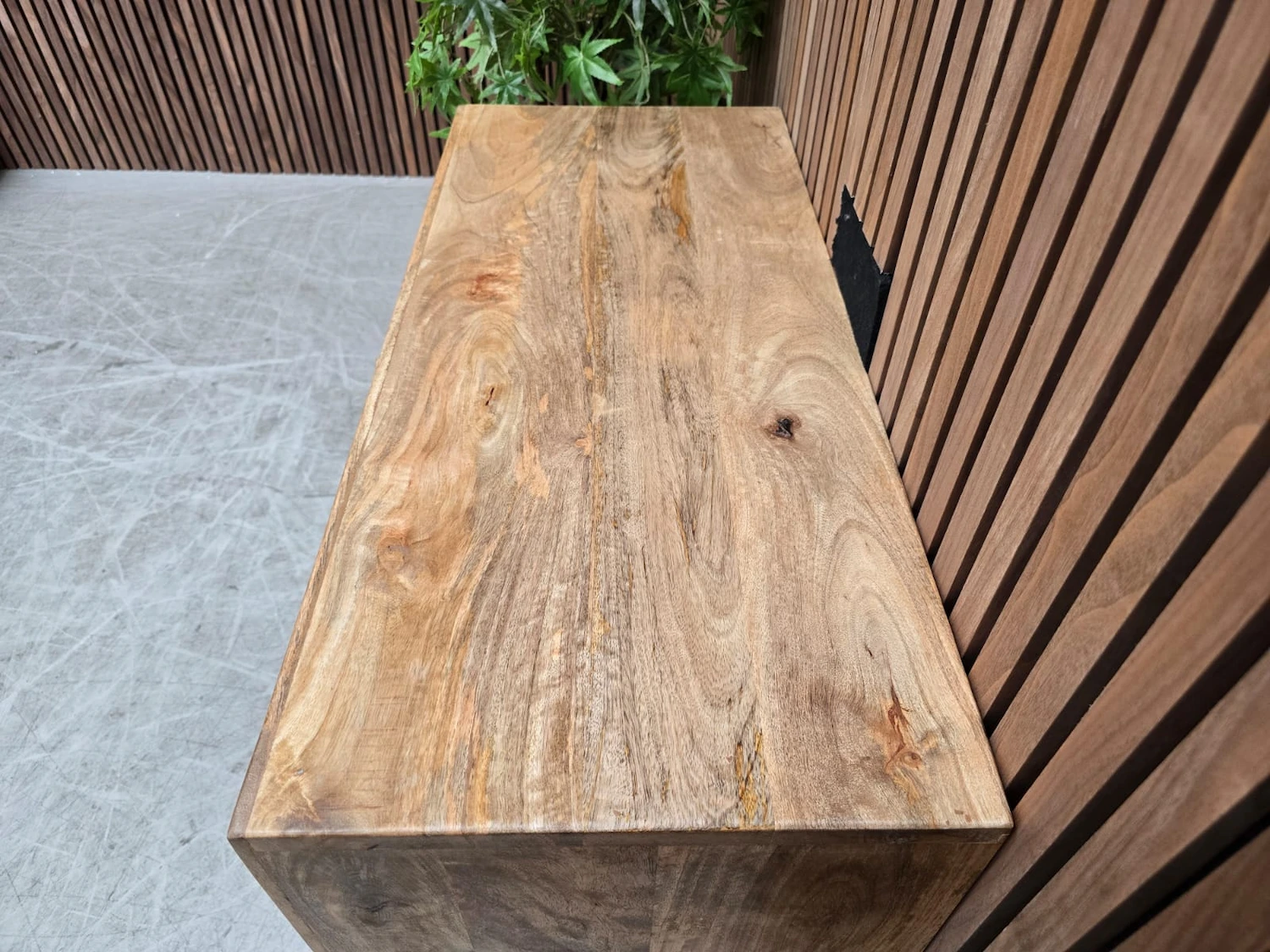 Rattan small 2 door sideboard 5 top of the sideboard showing the light wood grain