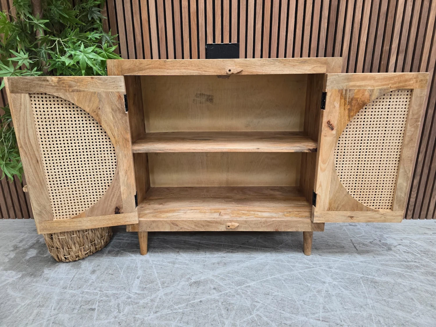 Rattan small 2 door sideboard 7 showing the inside the cupboard with a shelf