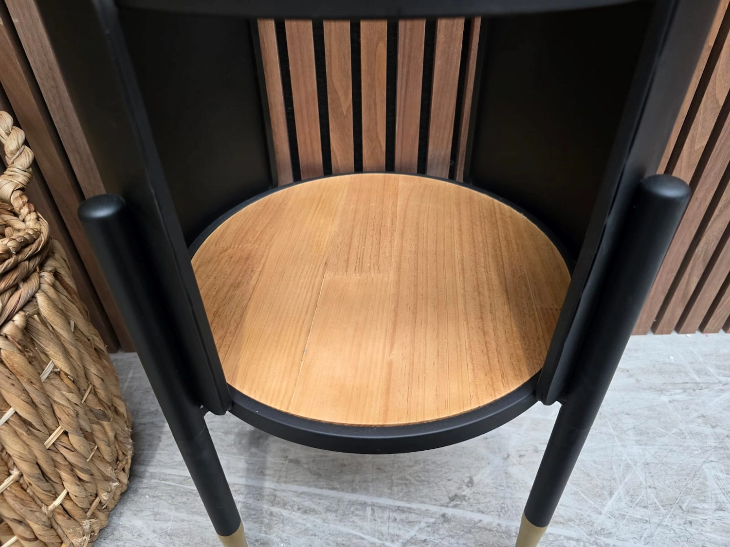 close up of the oak shelf that is on the bottom of the table