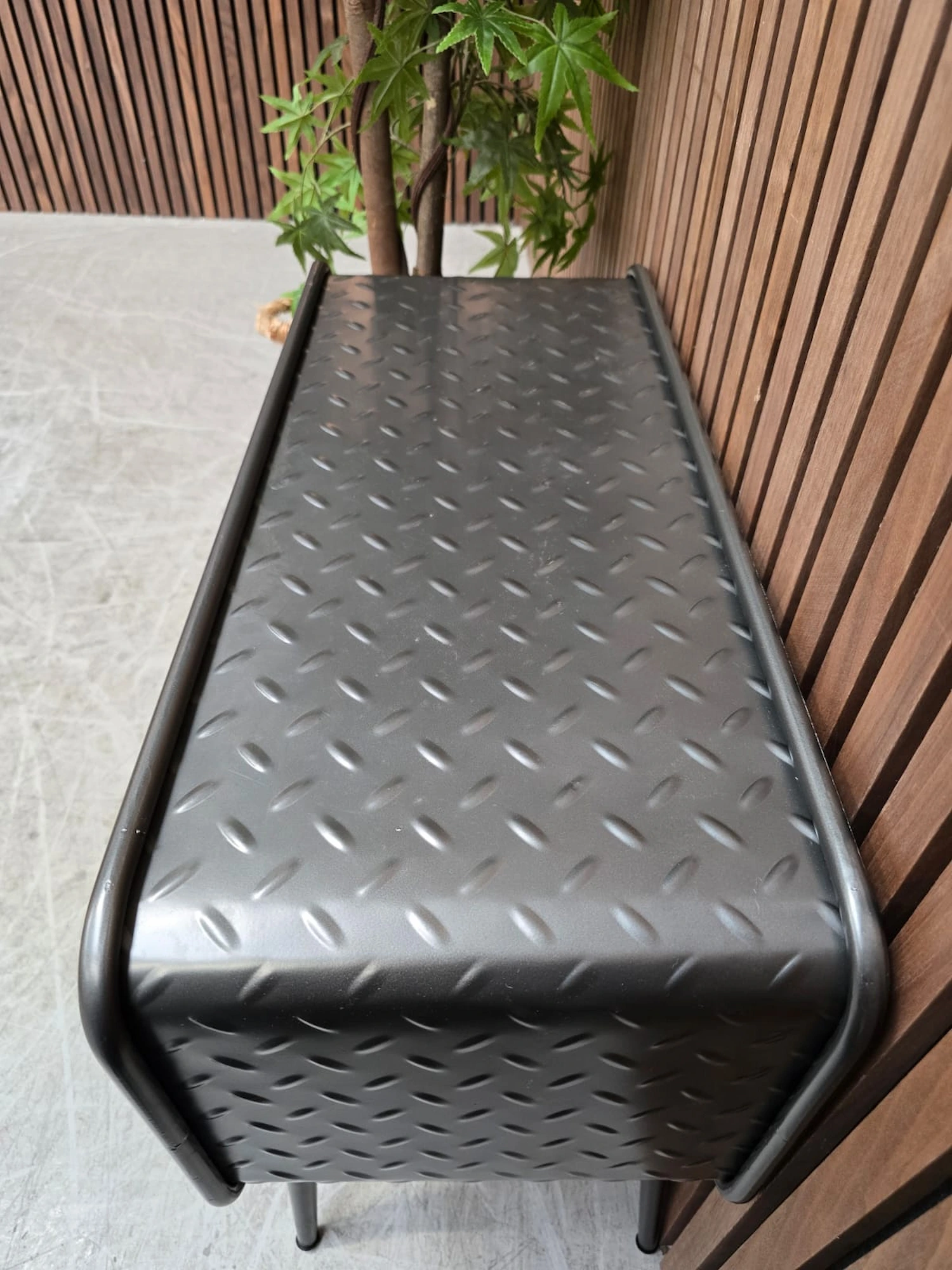 top of the silver small cabinet