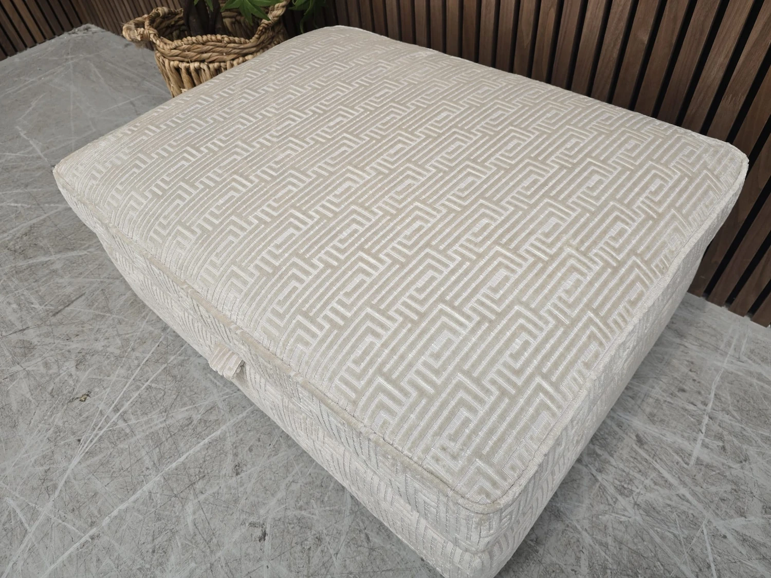 overview of the top on the valentino footstool showcasing the pattern