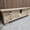 photo of the left side of the carved mango storage bench