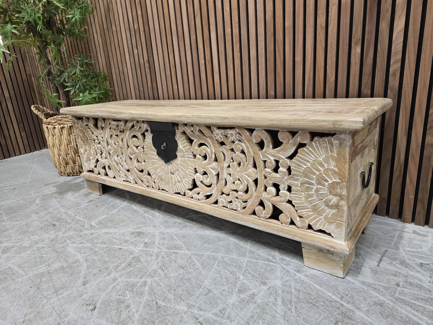 photo of the right side of the carved mango wooden storage bench
