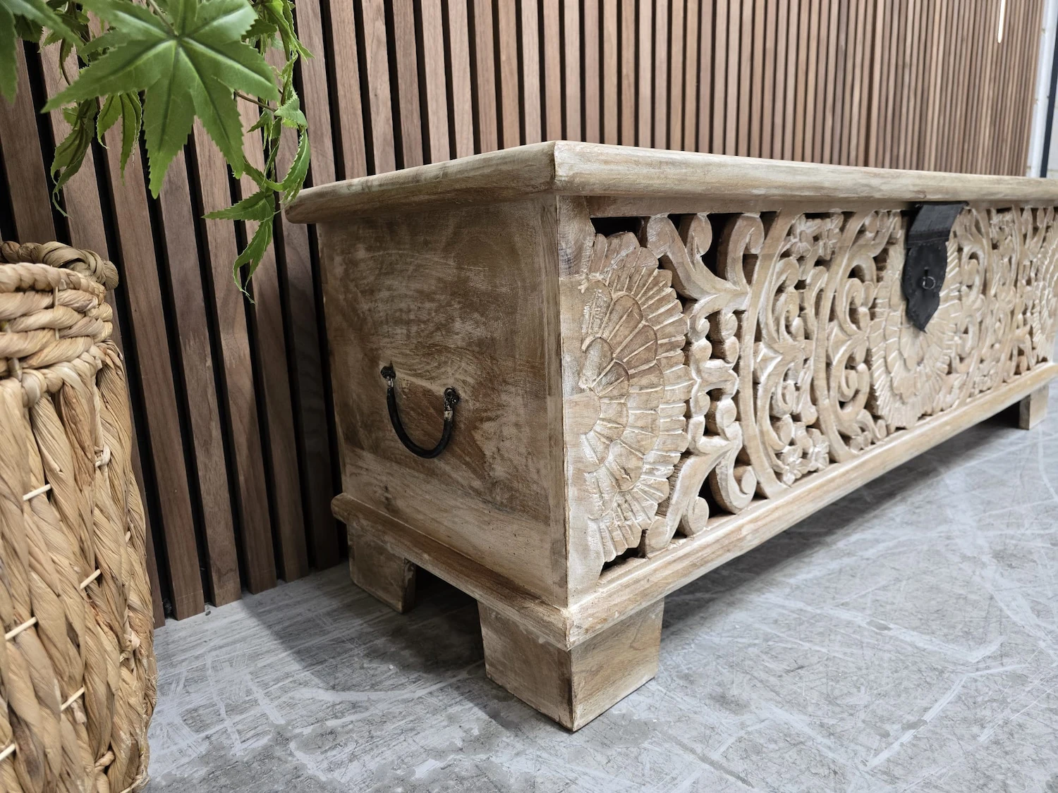 left side photo of the side panel detail carvings