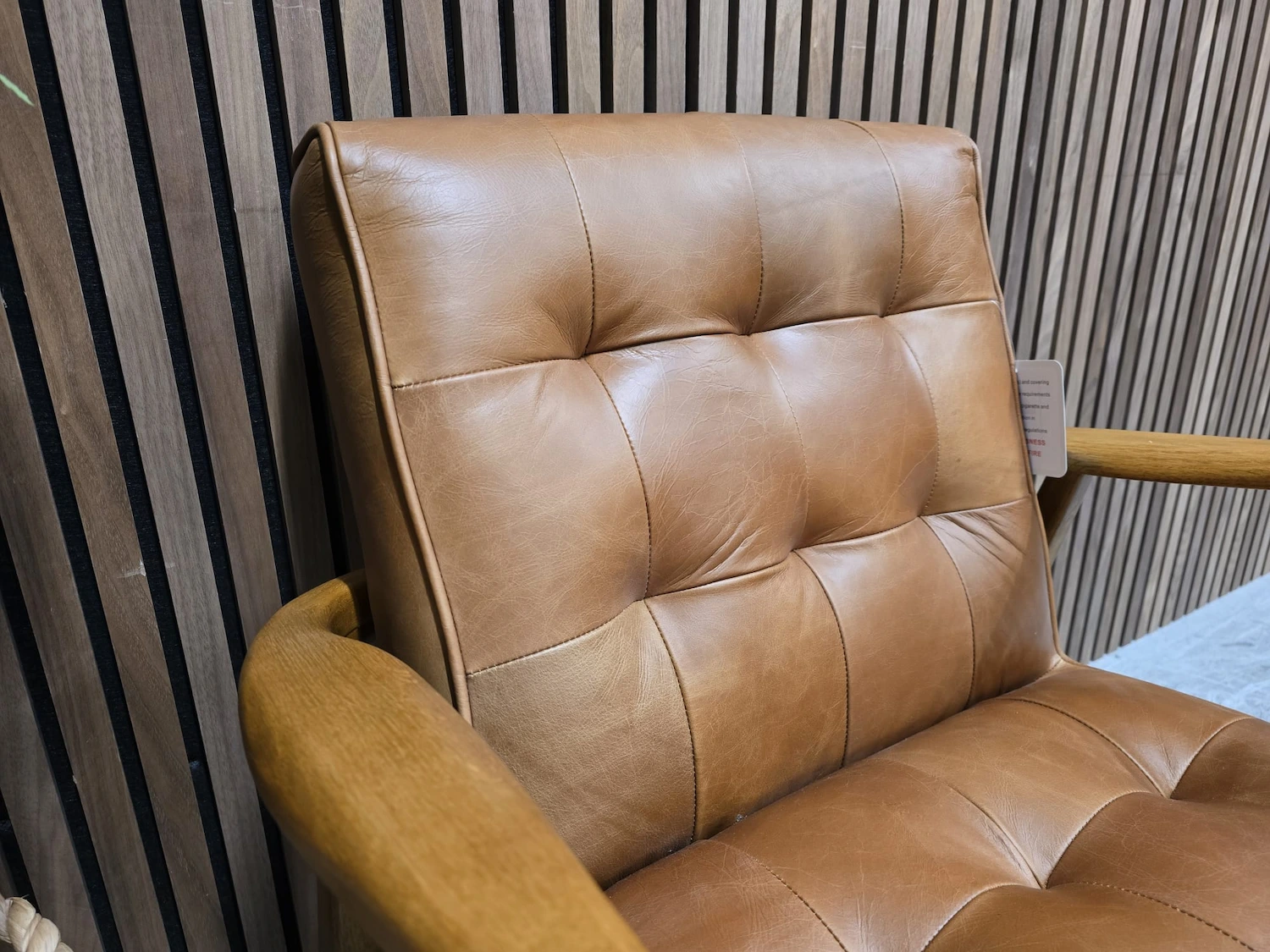 picture of back seat pad with buttoned detail