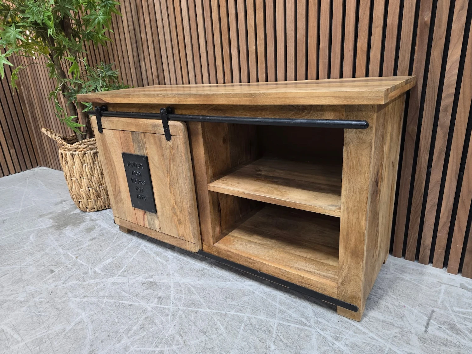 right side picture of the mango wood and iron sliding door tv stand