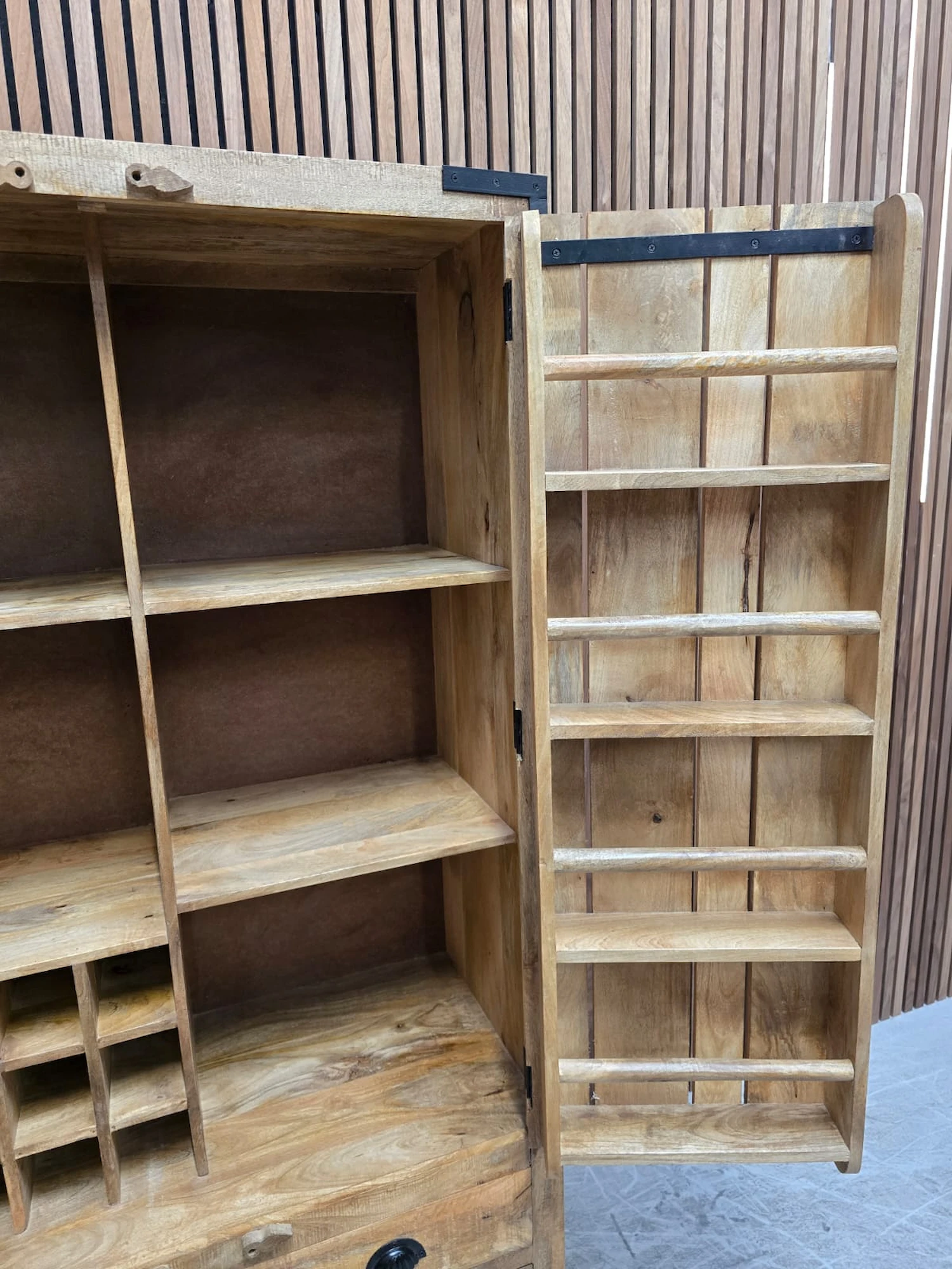 right side picture of inside door shwocasing a spice rack