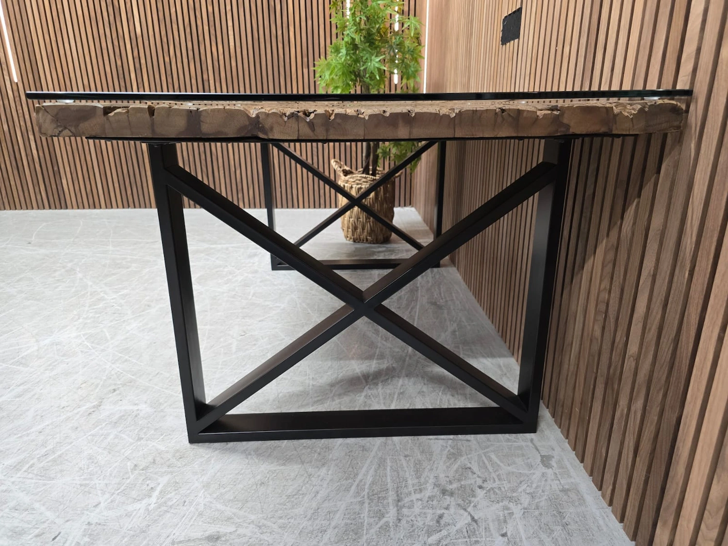 side angle from the right of the black powder coated x shape black legs