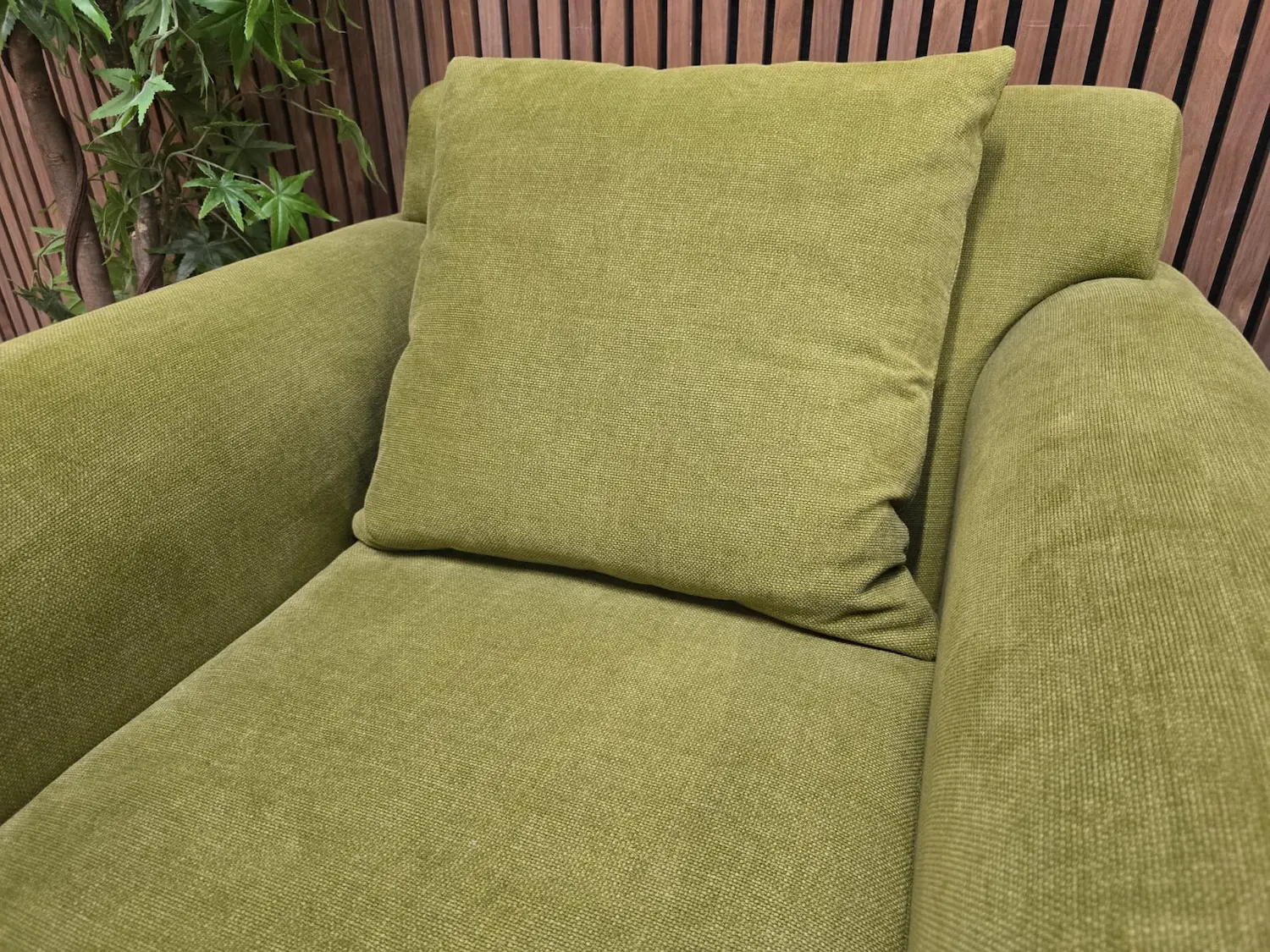 close up photo of the back cushion on the teddy armchair