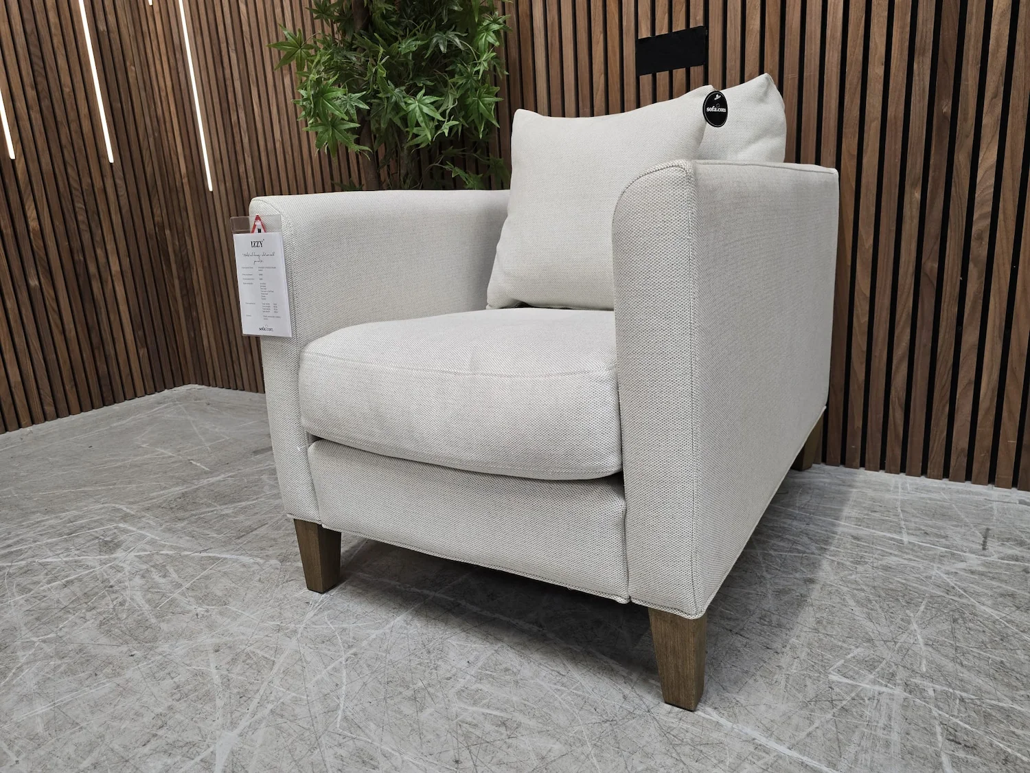 izzy armchair in pumice house basket weave from the right side