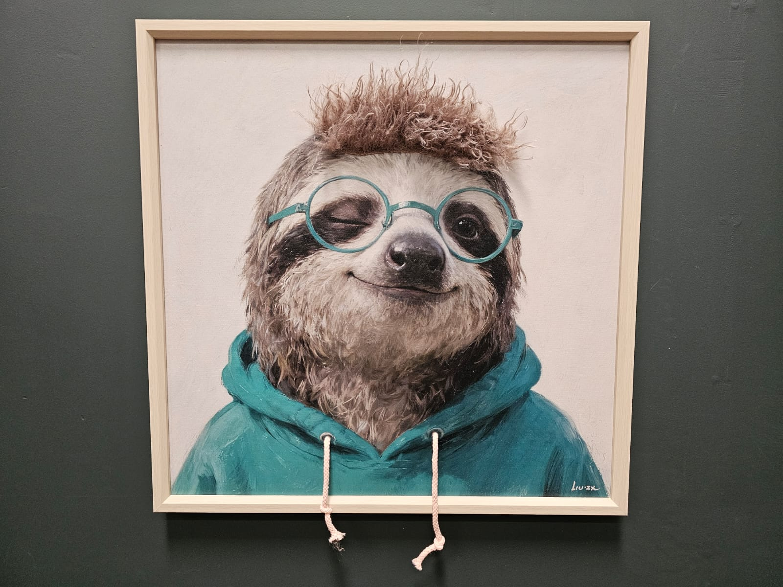 a sloth in a hoodie and glasses