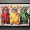 a picture of three kolas in hoodies