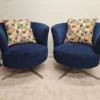 Pair Of Orla Kiely Lily Patterned Blue swivel chairs